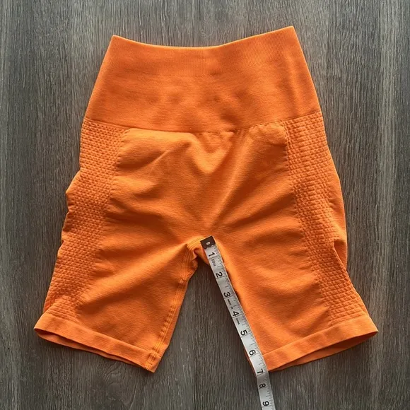 Alphalete Seamless Biker Shorts 7&quot; | Orange | Size S