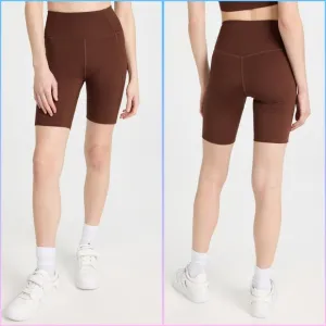 Girlfriend Collective High Rise Bike Shorts in Earth