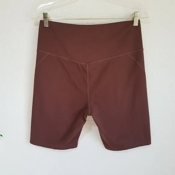 Girlfriend Collective High Rise Bike Shorts in Earth