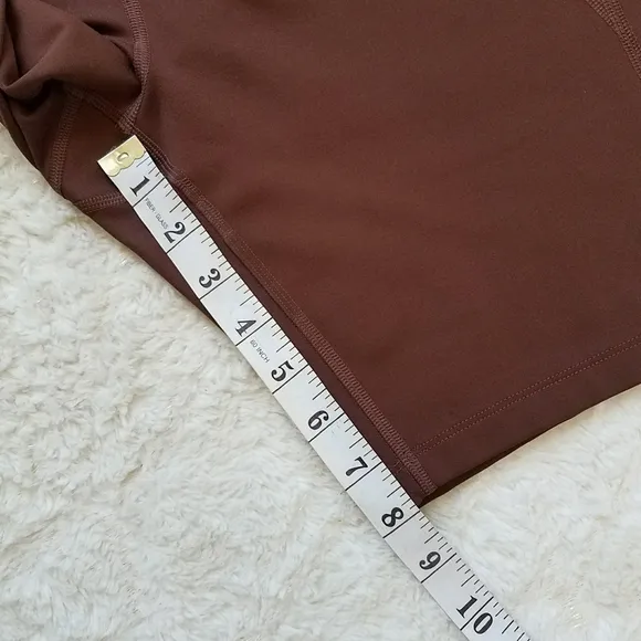Girlfriend Collective High Rise Bike Shorts in Earth