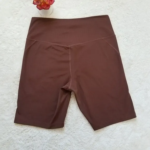 Girlfriend Collective High Rise Bike Shorts in Earth